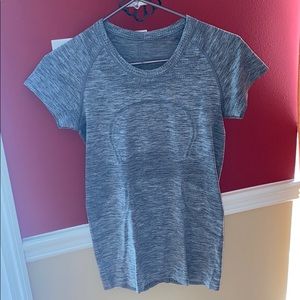 grey Lululemon shirt.